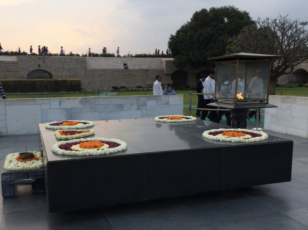 A flame burns at Raj Ghat – Mahatma Ghandi's cremation site. 