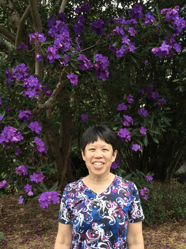 The botanical garden had many flowers as well as large indigenous fig trees.