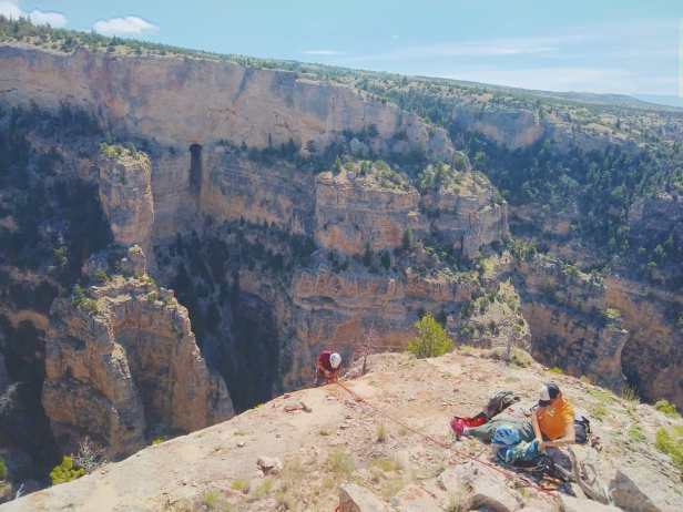 Penelope Vorster, USFS, Custer Gallatin NF, Preparing to rappel into canyon to access lead on opposite wall, MCC intern Dustin Kisner on rappel. BLM Pryor Mountains, 2019. 