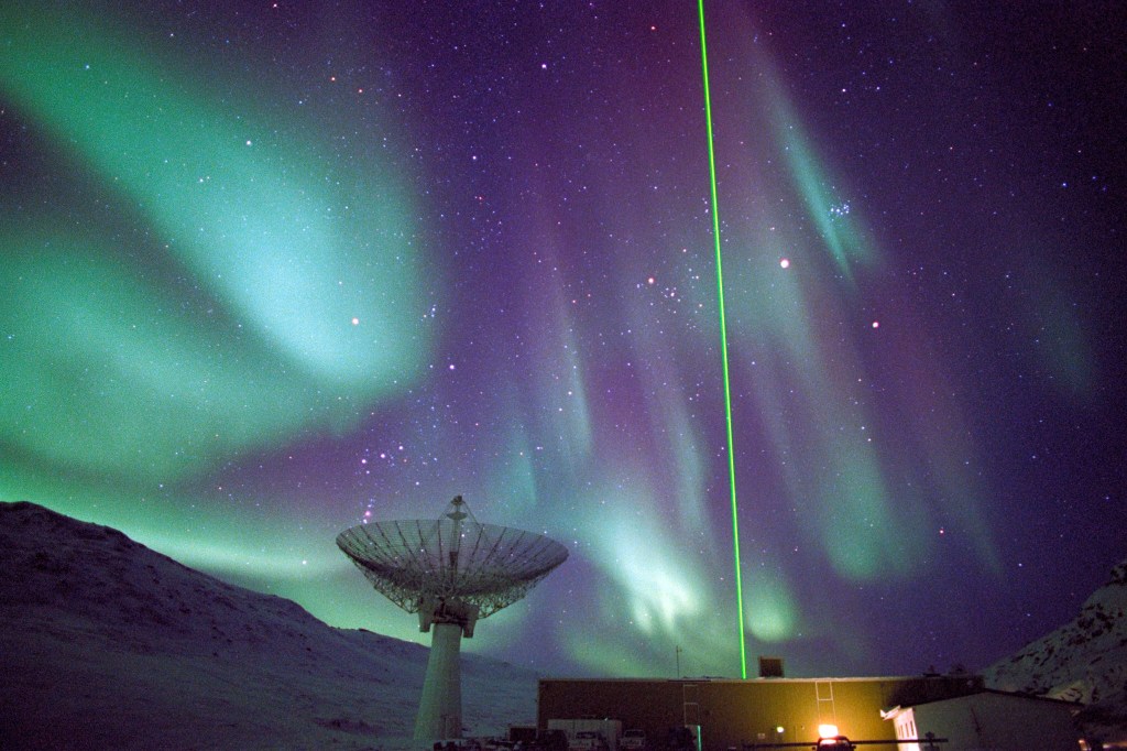 Aurora borealis--the "northern lights" -- light the sky over the Sondrestrom Upper Atmospheric Research Facility in Kangerlussuaq, Greenland.