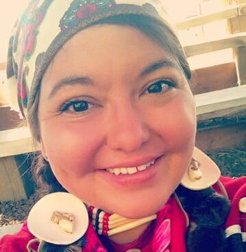 Sapóoq'is Wíit'as (Ciarra Greene) smiles into the camera