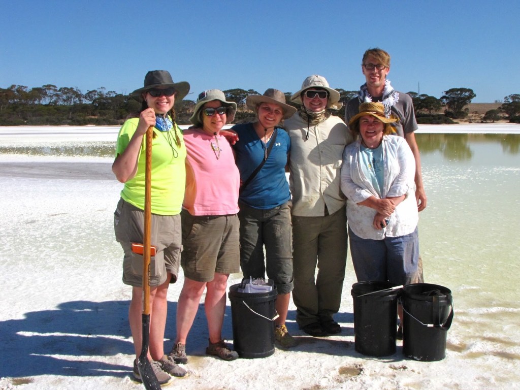 Kathy (far right) with, from left, student Lynnette Eichenlaub, microbiologist collaborator Dr. Melanie Mormile, student Sofia Andeskie, student Joey Pritt, and student Jonathan Knapp, at pH 1.4 Gneiss Lake in Western Australia.