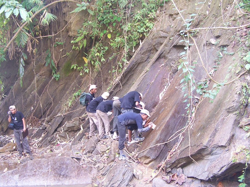 Figure 5. Geology students are busy at collecting structural data from the highly folded Neogene clastics. Medium to fine-grained and well-bedded sandstone of Boka Bil Formation (Upper Miocene) is exposed in Balukhali Khal section of Sitakund anticline, Chittagong, Bangladesh.