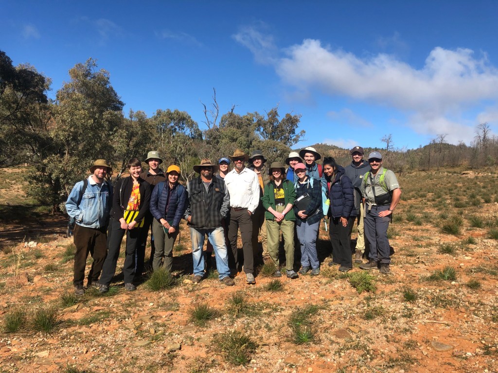 FIGURE 3: A small but enthusiastic cohort of third-year geology majors from the University of Melbourne undertaking an advanced field work subject with Adnyamathanha man Kristian Coulthard and Associate Professor Mark Quigley in the central Flinders Ranges (July 2021). Incorporating more Indigenous cultural content into undergraduate subjects is strongly supported by many geoscience students and can advance the depth of breadth of our teaching and learning.